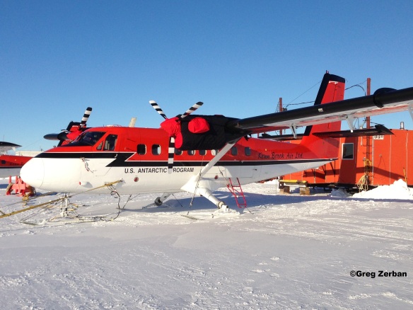 This is a Twin Otter plane.  It's used to fly to remote field camps.  You can actually fit a few snowmobiles in the back too.