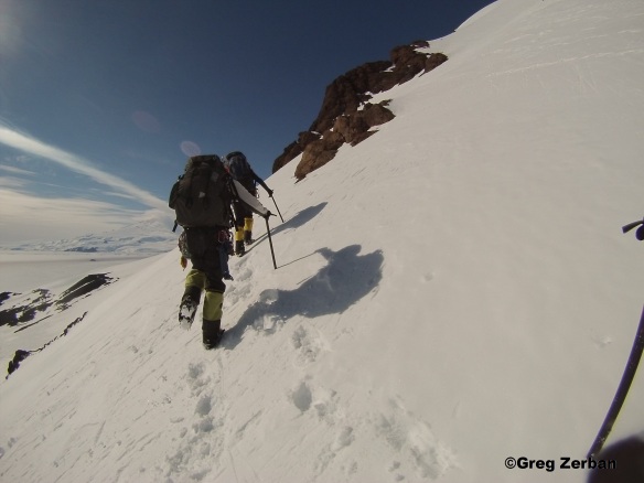 Traversing a slope on the back side of Castle Rock  with crampons and ice axes.